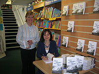 Christine signing copies of her book in Thirsk